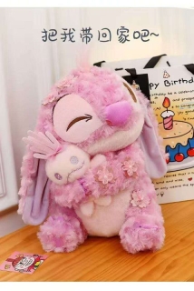 STICH FLORES Y SCRUMP AZUL Y ROSA 35 CM